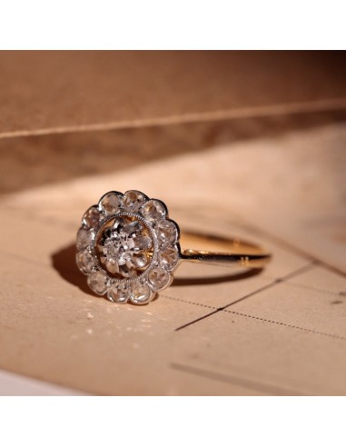 Bague marguerite ancienne deux ors et diamants les muscles